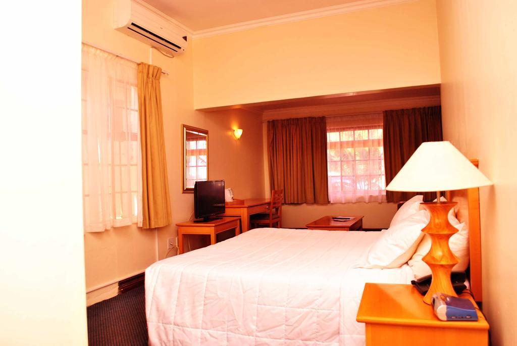 The George Hotel Manzini Camera foto